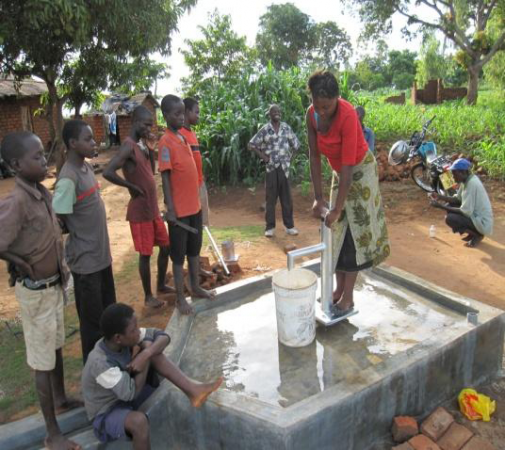 Drawing water from the well.